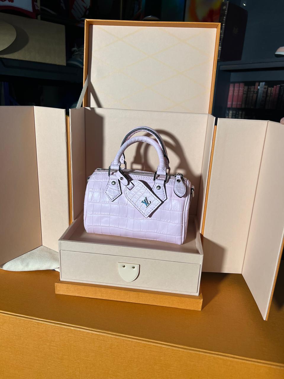 Bolsa Speedy Louis Vuitton piel de cocodrilo rosa