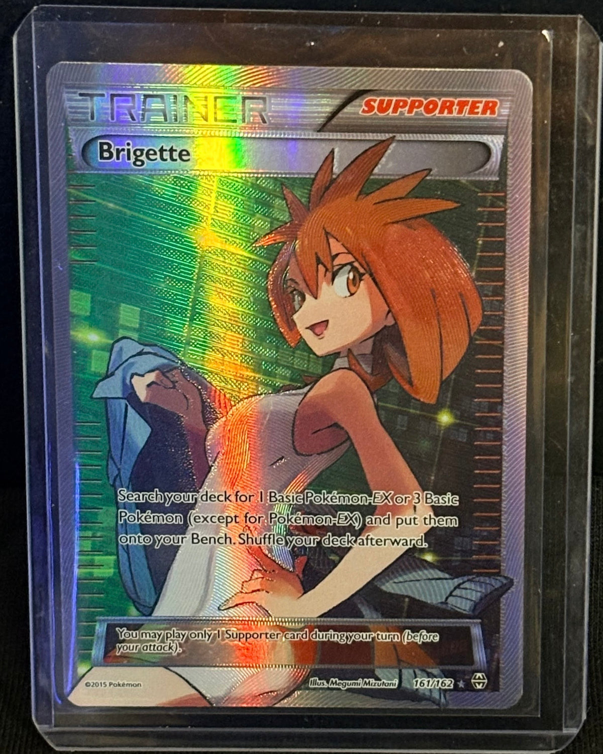CARTA POKEMON Brigette 161/162 – Full Art