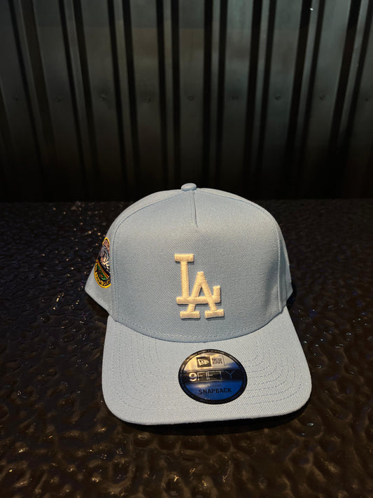 GORRA NEW ERA LOS ANGELES 50TH SKY BLUE SNAPBACK